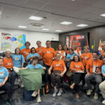 Defesa Civil de SC recebe grupo com Síndrome de Down em simulado de gestão de desastres