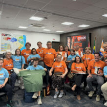 Defesa Civil de SC recebe grupo com Síndrome de Down em simulado de gestão de desastres